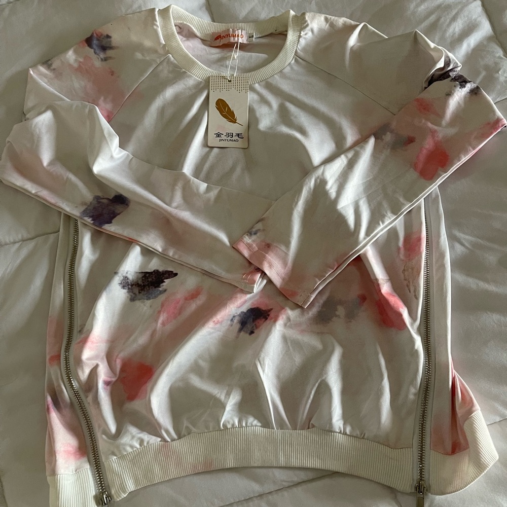Bought from japan as gift new with tags . Super soft, has side zippers